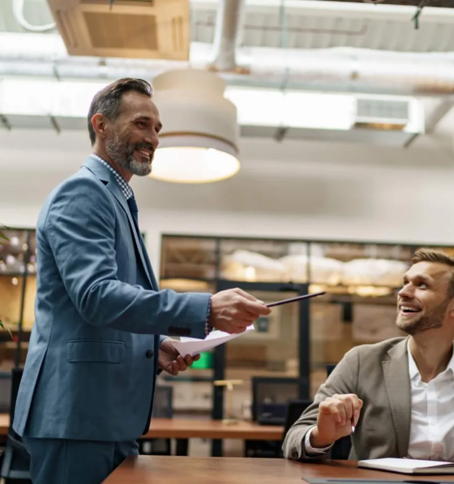 Consultant presenting to a group of business people